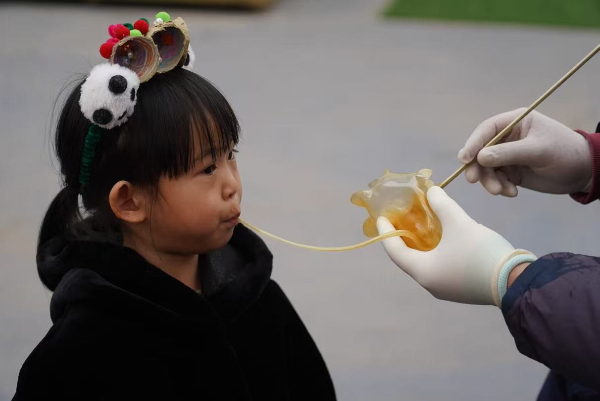 新时代幼儿园举办的非遗体验活动